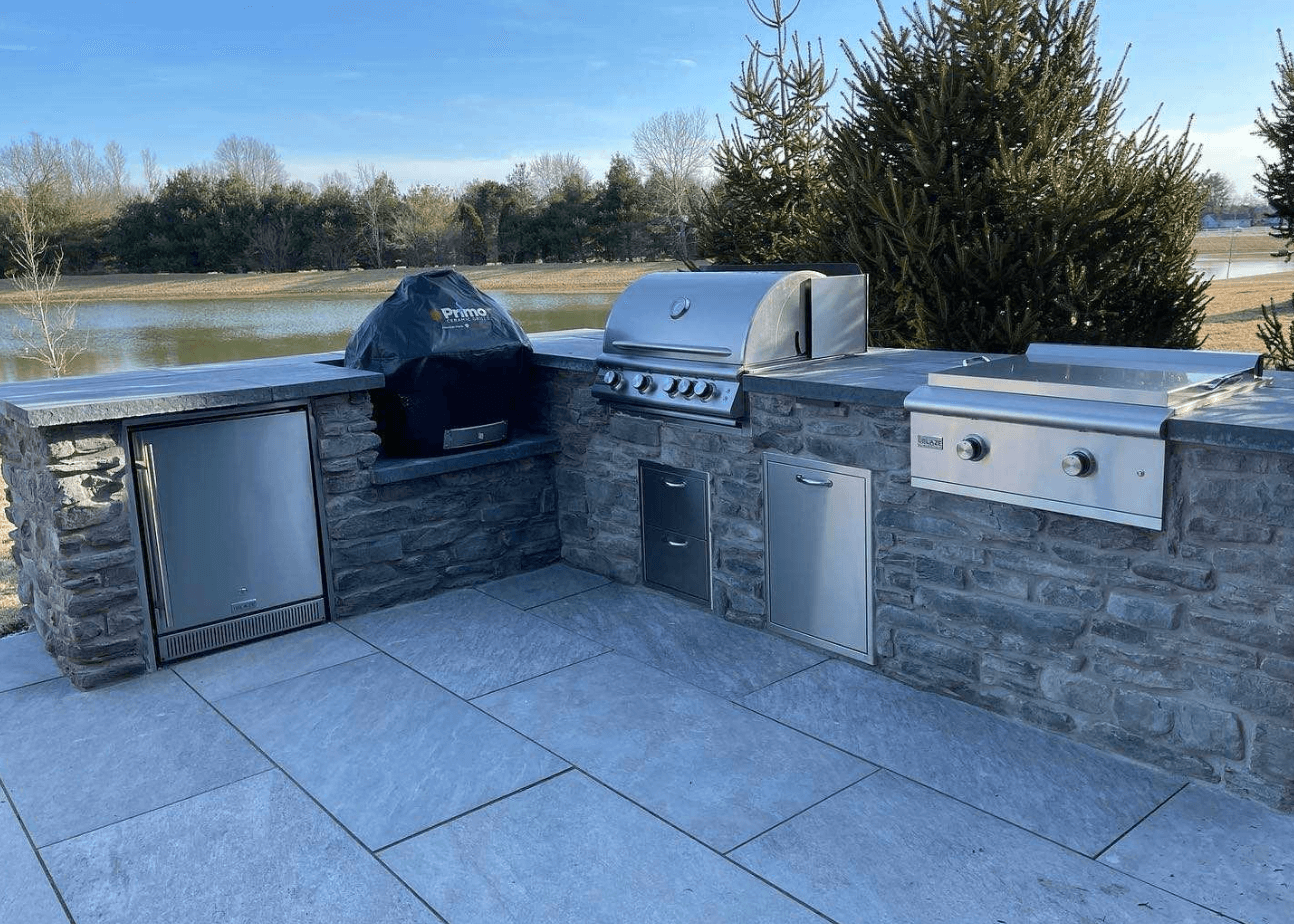 Lakeside Outdoor Kitchen & Fireplace — completed landscape